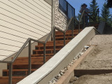 Exterior grab rail for stairs